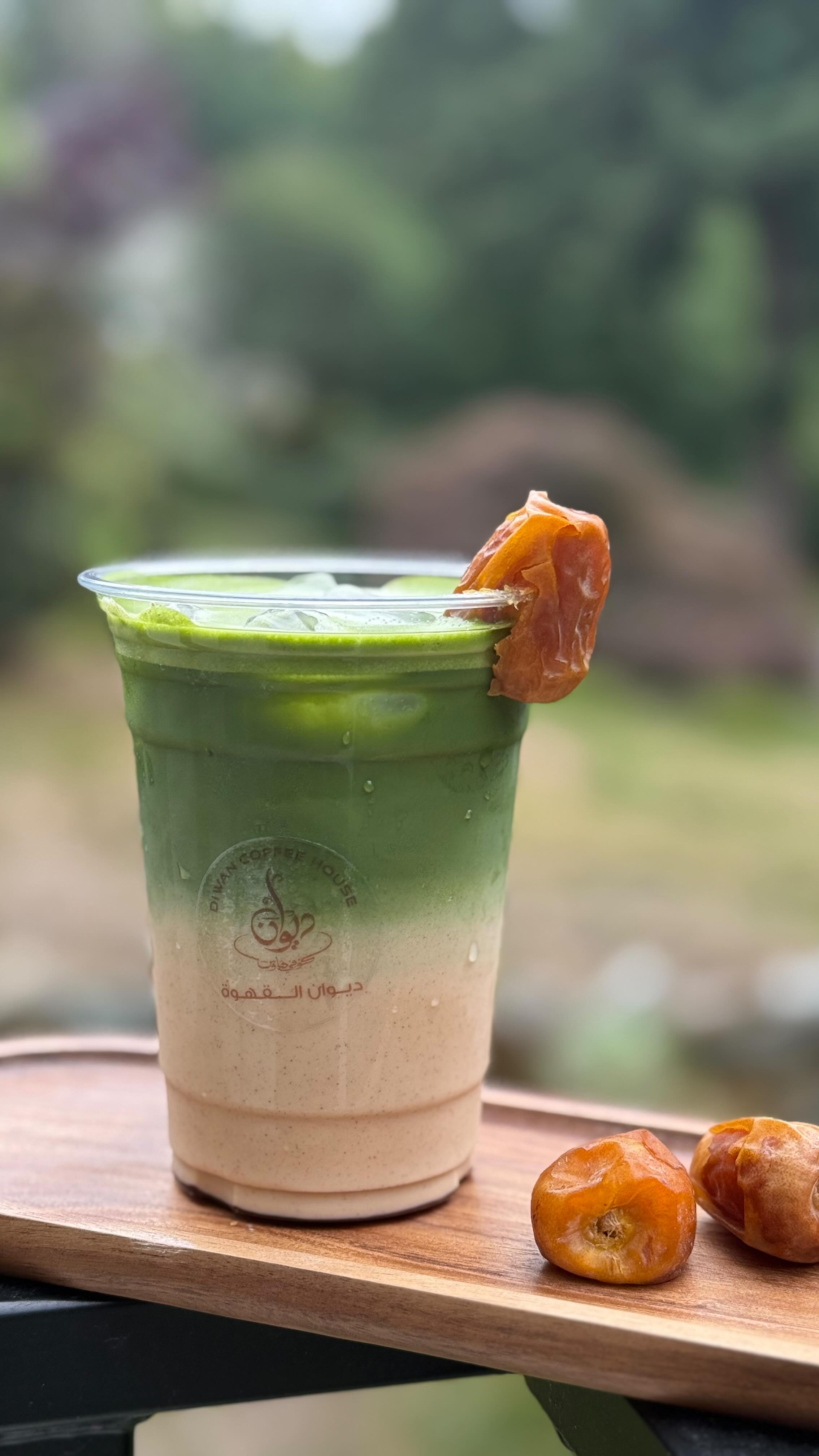 Iced date matcha latte — green tea layered with house-made date cream