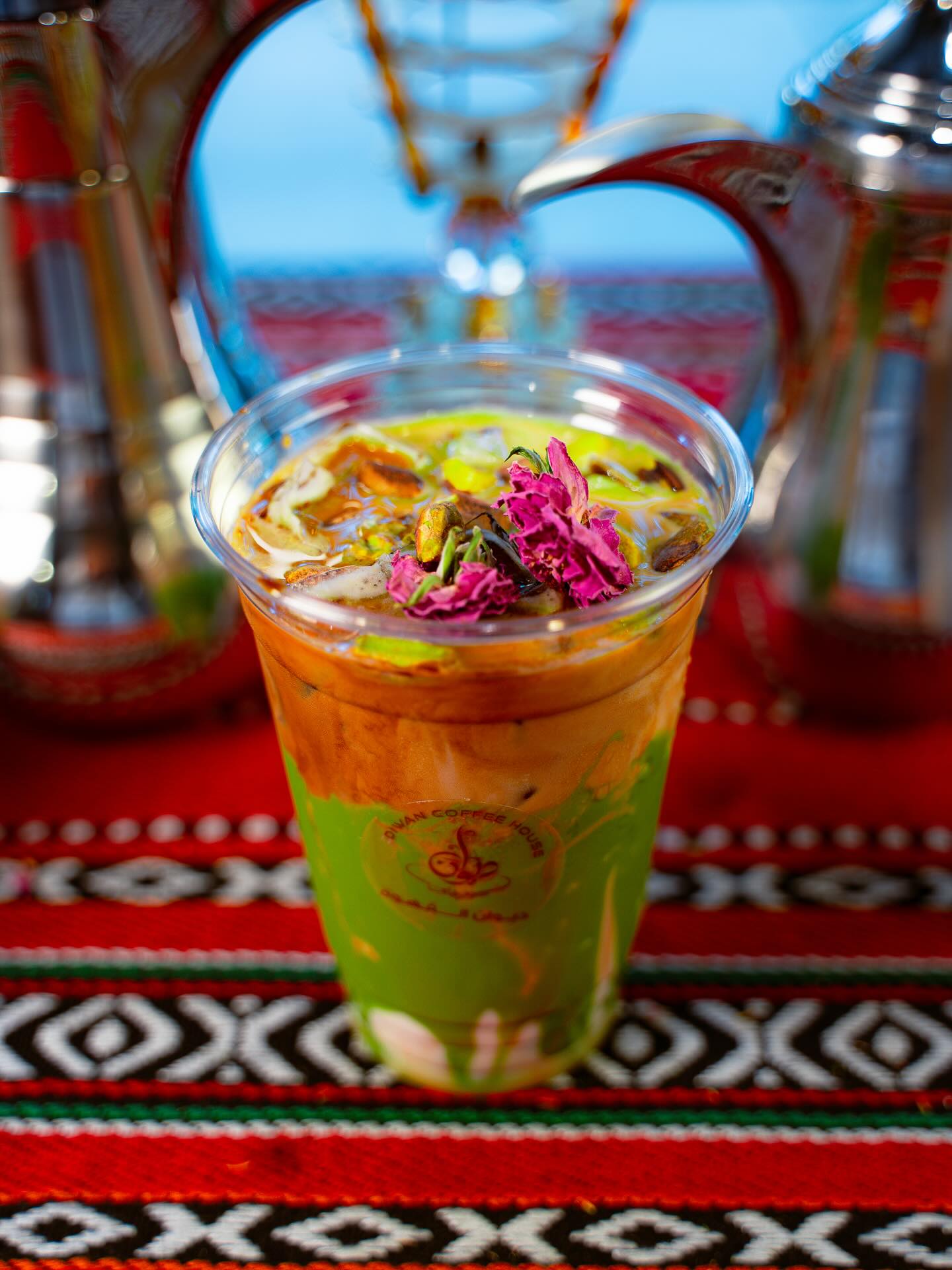Layered rose petal and pistachio specialty drink